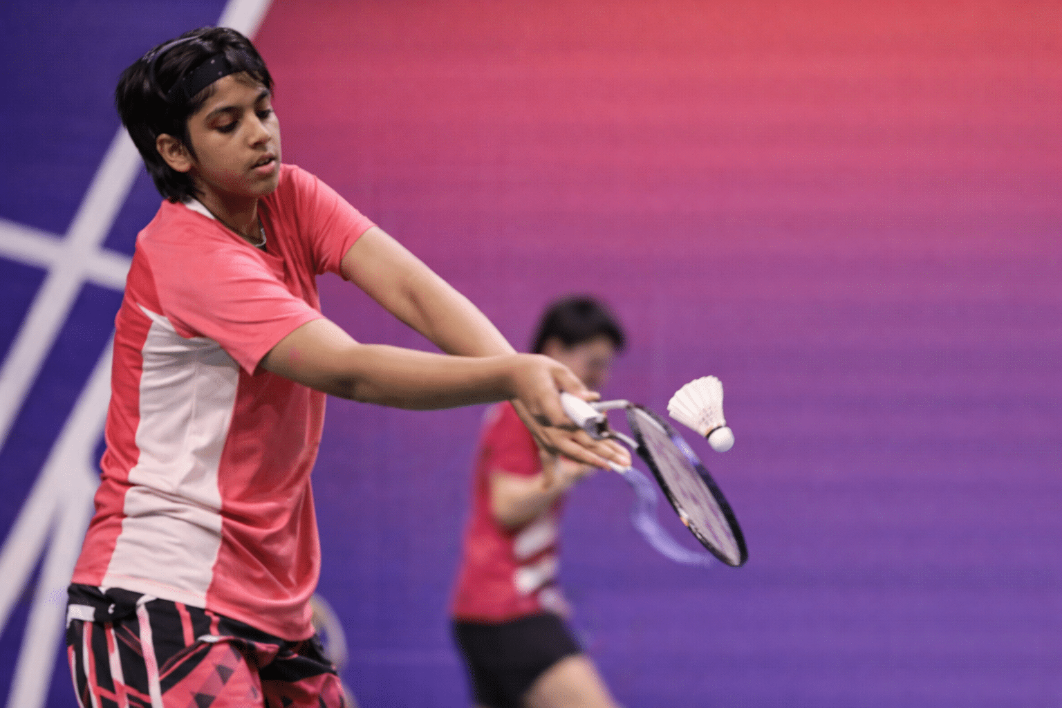 An energetic world badminton match.