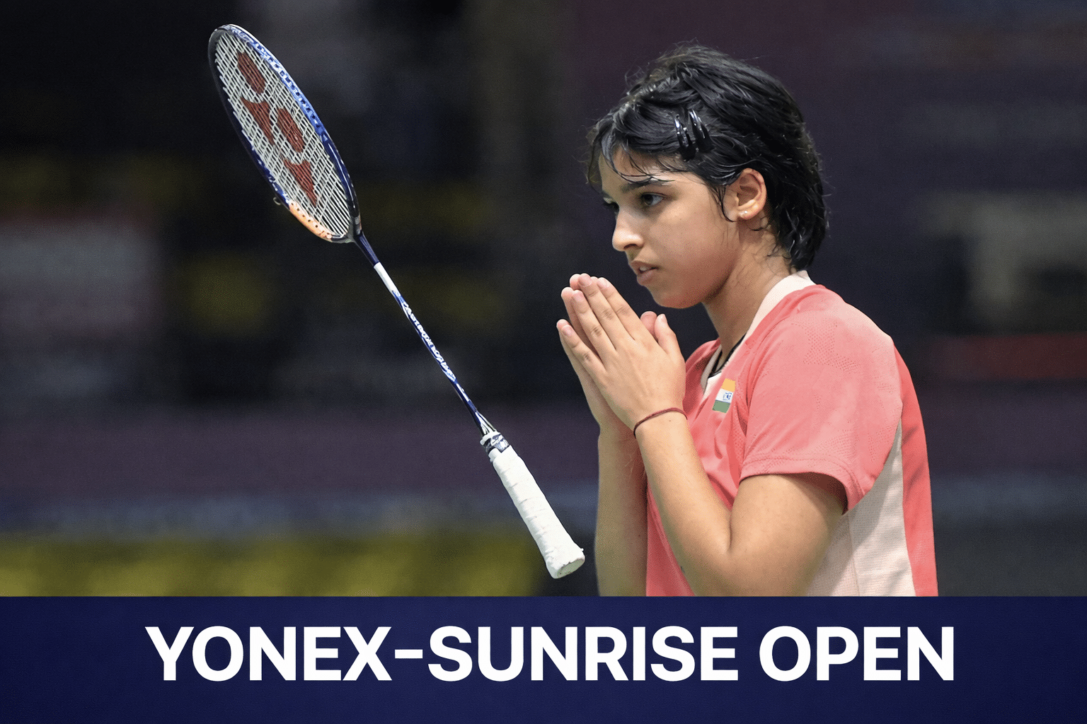 Female badminton player at the YONEX-SUNRISE OPEN tournament.